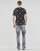 Vêtements Homme T-shirts manches courtes Puma ESS+ LOGO POWER AOP Noir