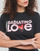Vêtements Femme T-shirts manches courtes Converse RADIATING LOVE SS CLASSIC GRAPHIC Noir